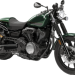 ilustracja przedstawia zielony motocykl